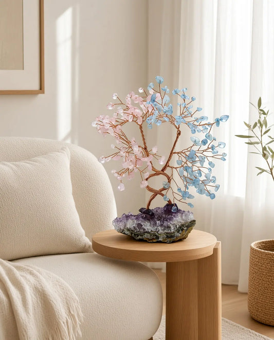 Rose quartz and aquamarine crystal tree on a living room side table