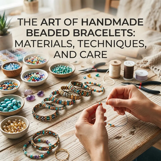Crafter’s hands threading colorful seed beads onto a needle to make a handmade bracelet