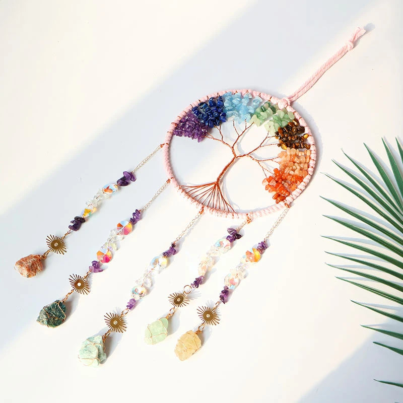 Close-up of copper wire tree of life wrapped with seven chakra natural gemstone chips — amethyst, lapis lazuli, aquamarine, aventurine, tiger eye, carnelian — on circular macramé frame