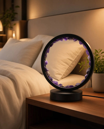 Amethyst glow lamp on a bedroom nightstand