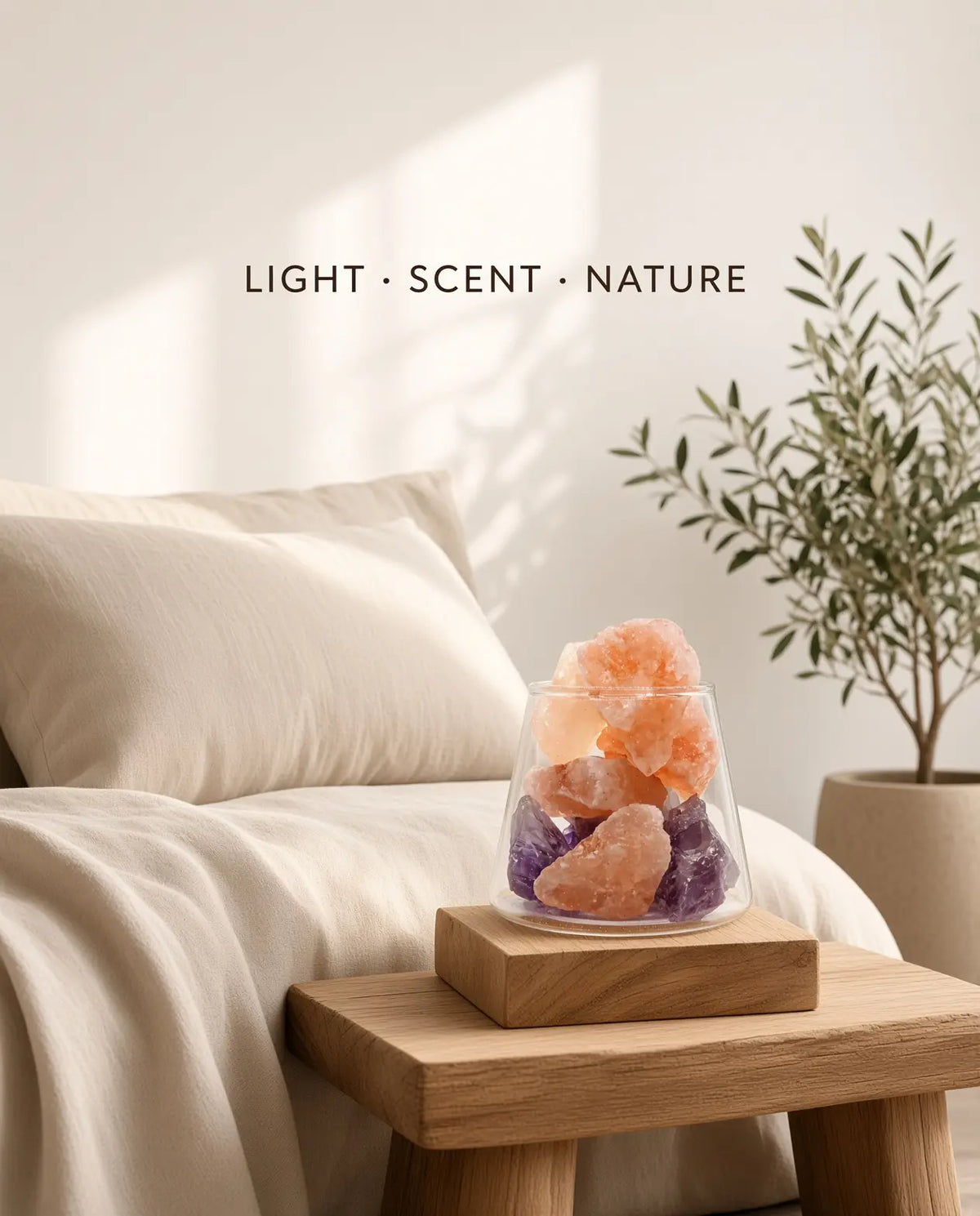 Amethyst and Himalayan salt aroma lamp on a bedroom nightstand