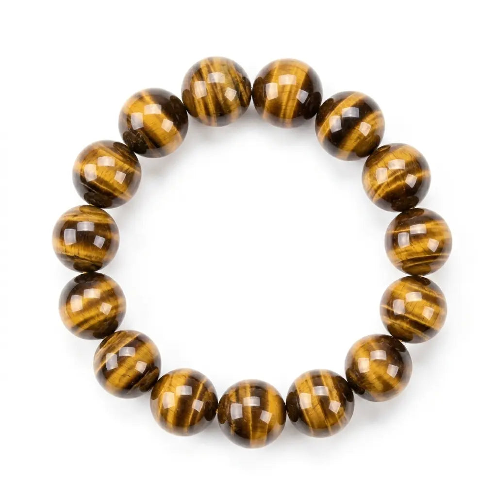 Natural tiger's eye beaded bracelet with large 14mm round stones displaying rich golden-amber and dark brown chatoyant bands