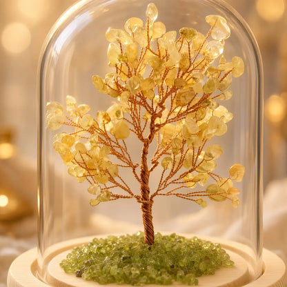 Close-up of citrine glow tree under a glass dome