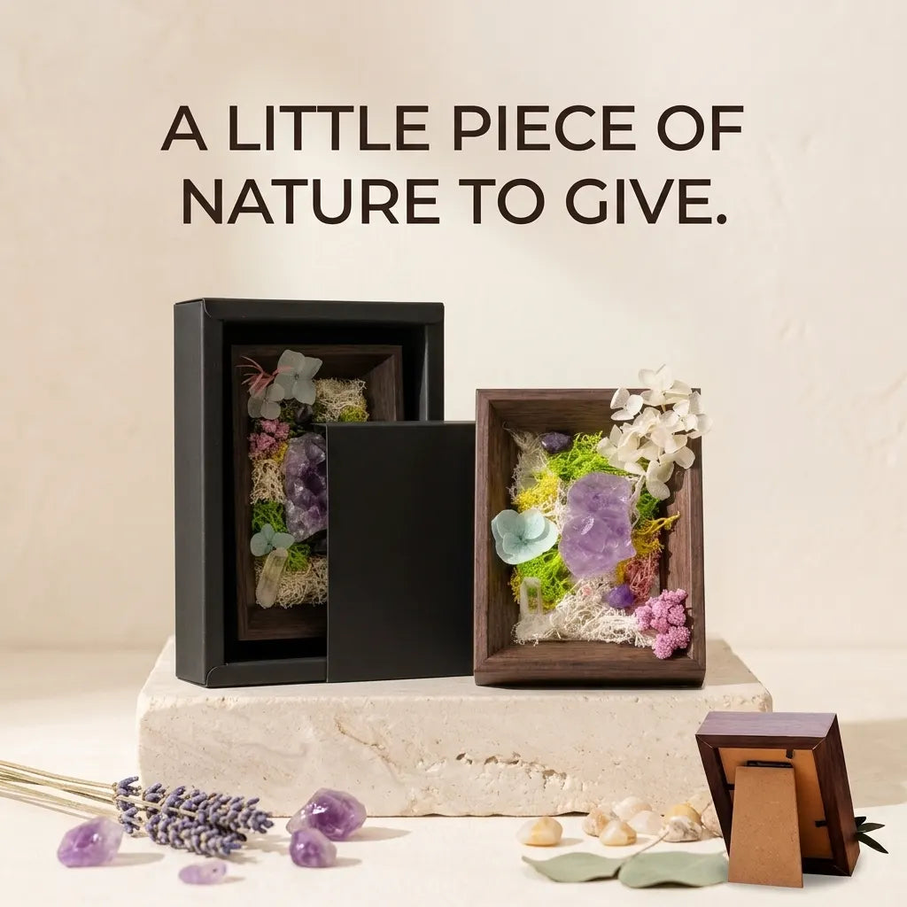 Amethyst framed landscape next to its black gift box, with the line “A little piece of nature to give”