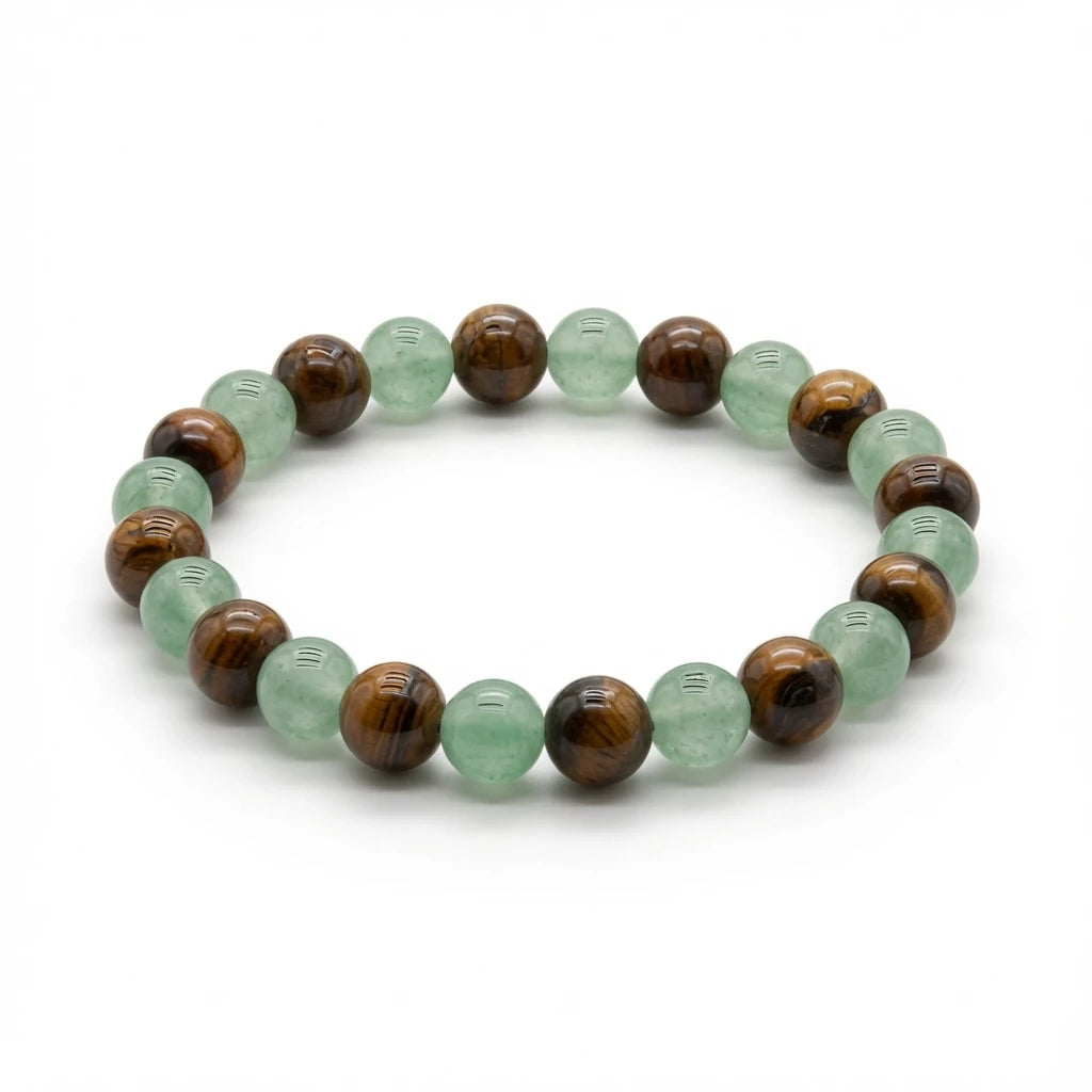 Green aventurine and tiger's eye beaded bracelet in green and amber tones, flat lay