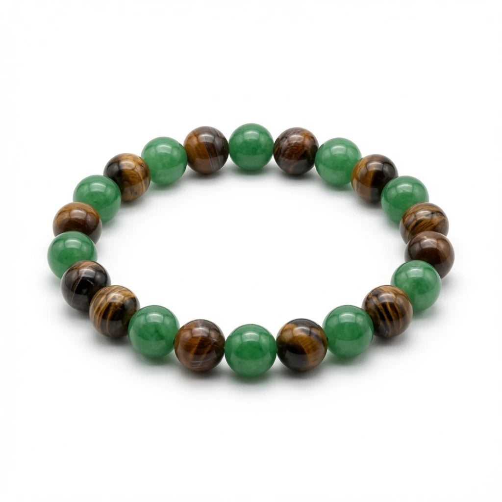 Green aventurine and tiger's eye beaded bracelet in green and amber tones, flat lay