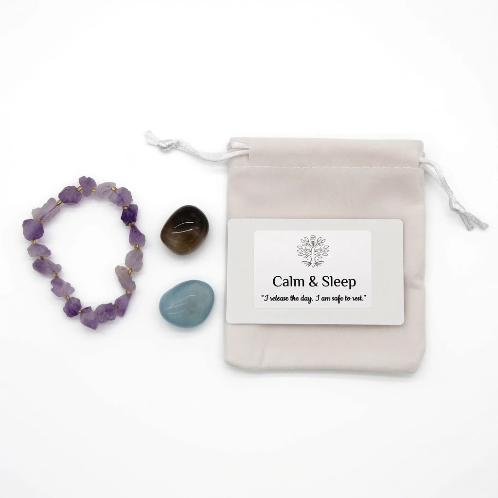 Calm and Sleep affirmation card with botanical illustration reading "I release the day, I am safe to rest" beside linen crystal pouch, bedtime healing ritual gift set