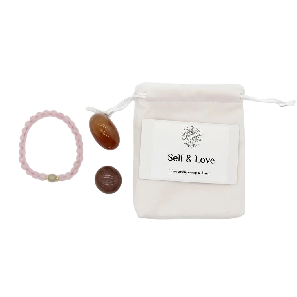 Self and Love healing crystal gift set with rose quartz beaded bracelet, tumbled carnelian, tumbled sunstone, affirmation card, and linen drawstring pouch on white background