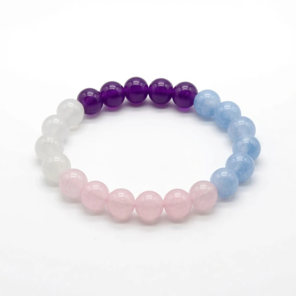 Moonstone, rose quartz, aquamarine and amethyst beaded bracelet in pastel colorblocks, flat lay