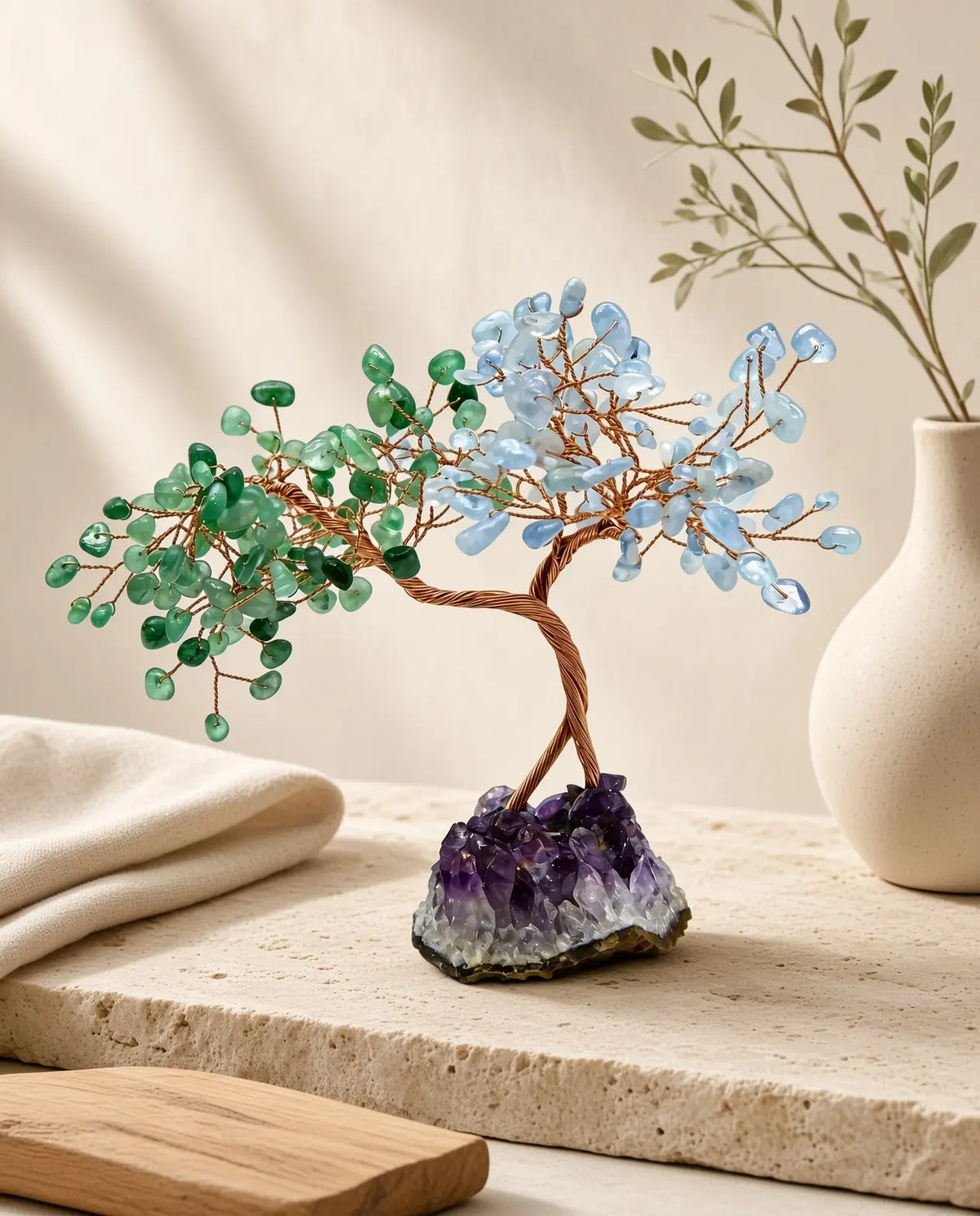 Rose quartz and aquamarine crystal tree styled with natural home decor