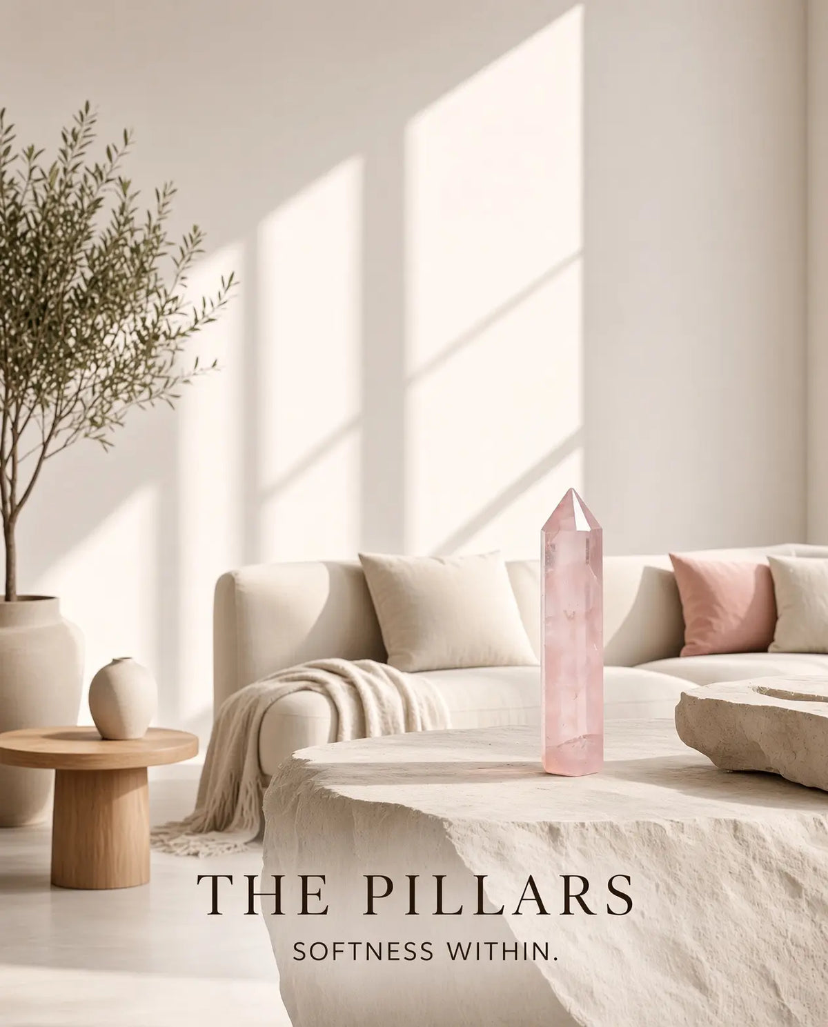 Rose quartz crystal tower in a sunlit living room with “The Pillars” brand text