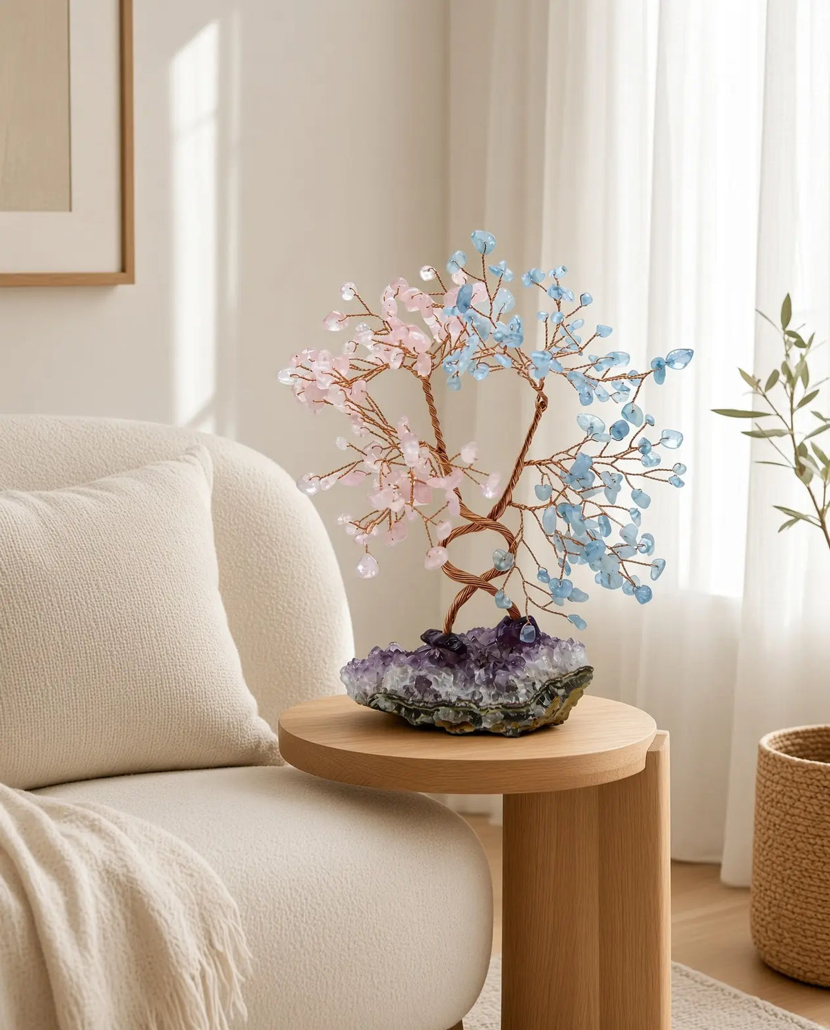 Rose quartz and aquamarine crystal tree on a living room side table