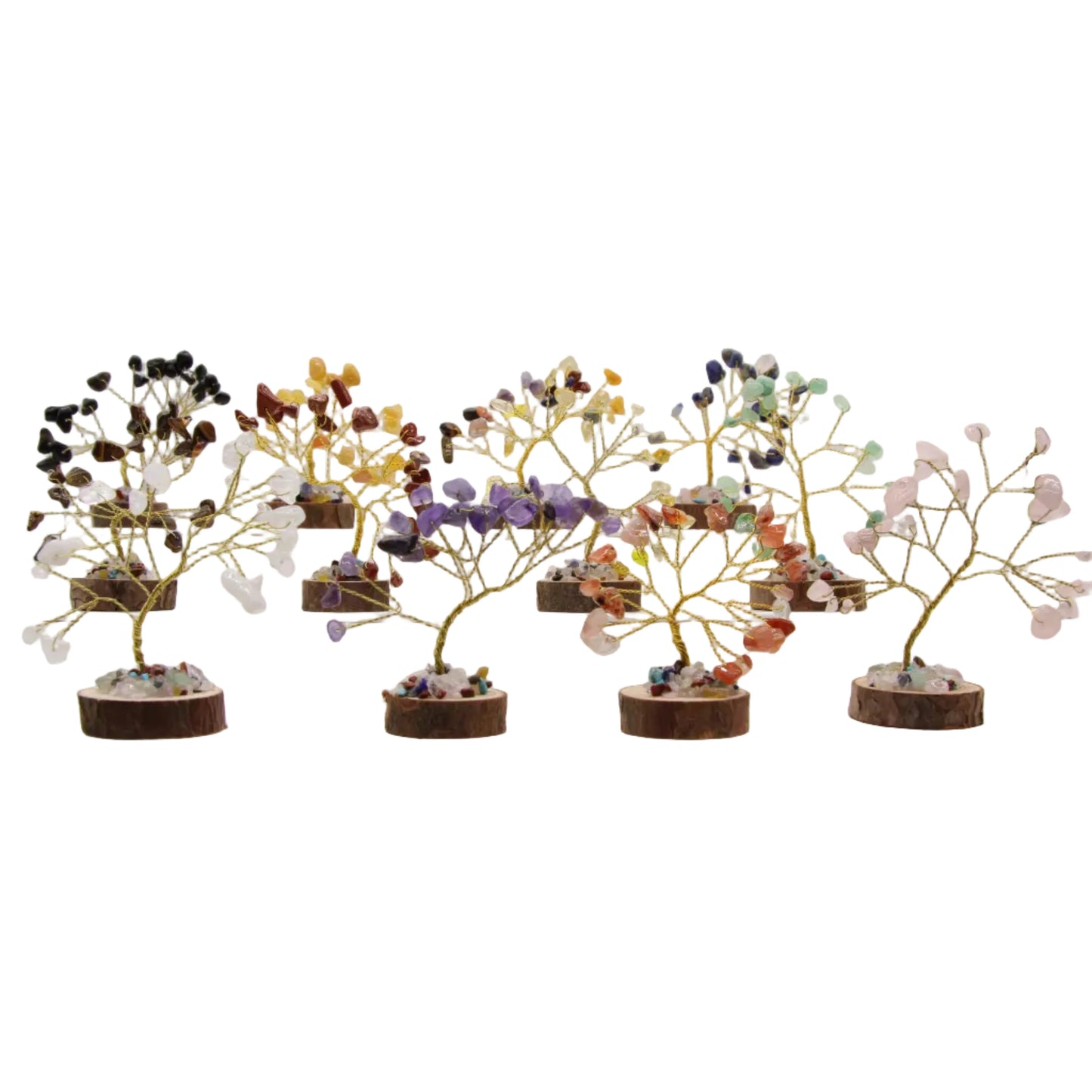 Set of 7 mini crystal tree of life decor pieces with natural wood bases, featuring various healing gemstones on a white background.